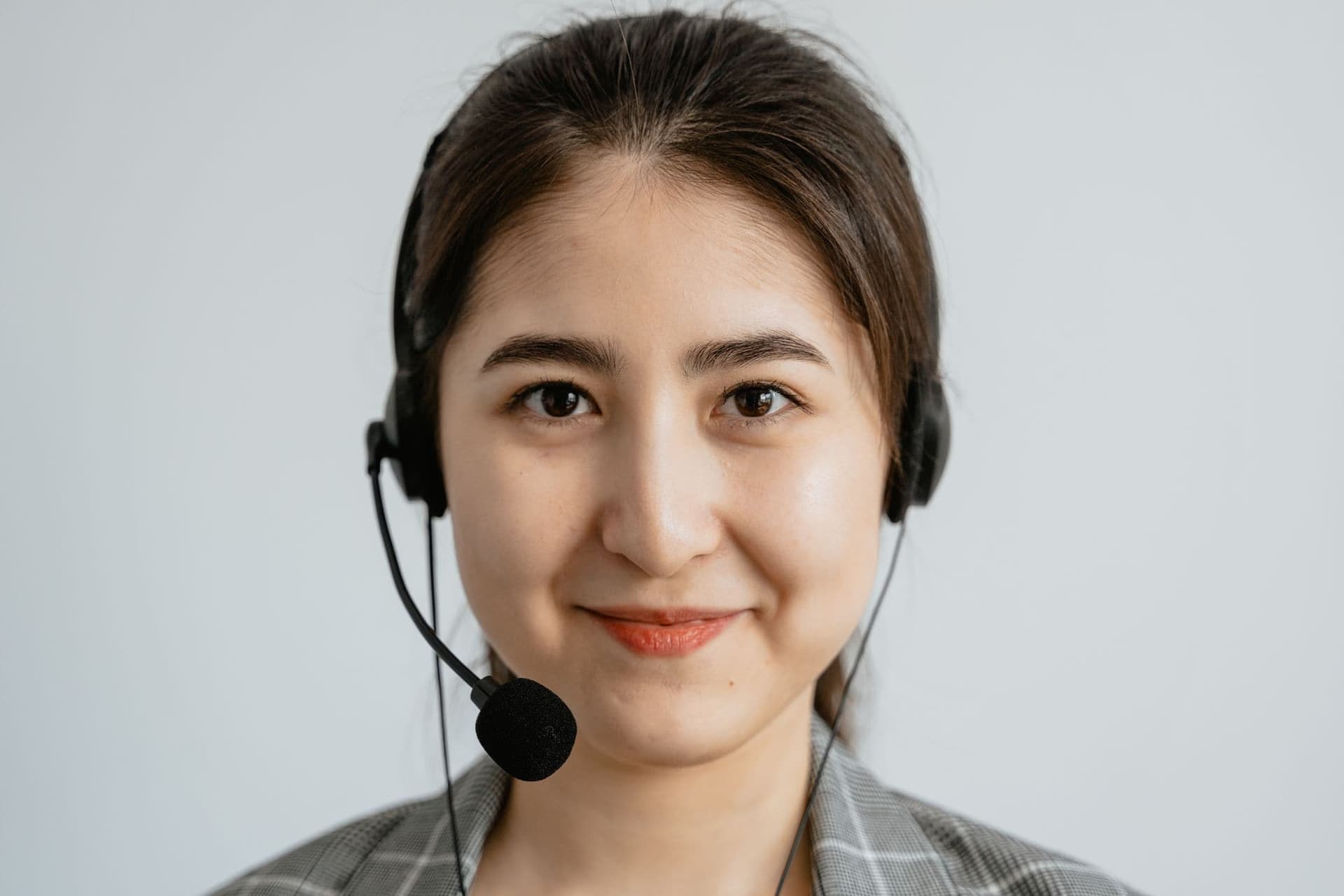 Smiling customer service representative wearing a headset
