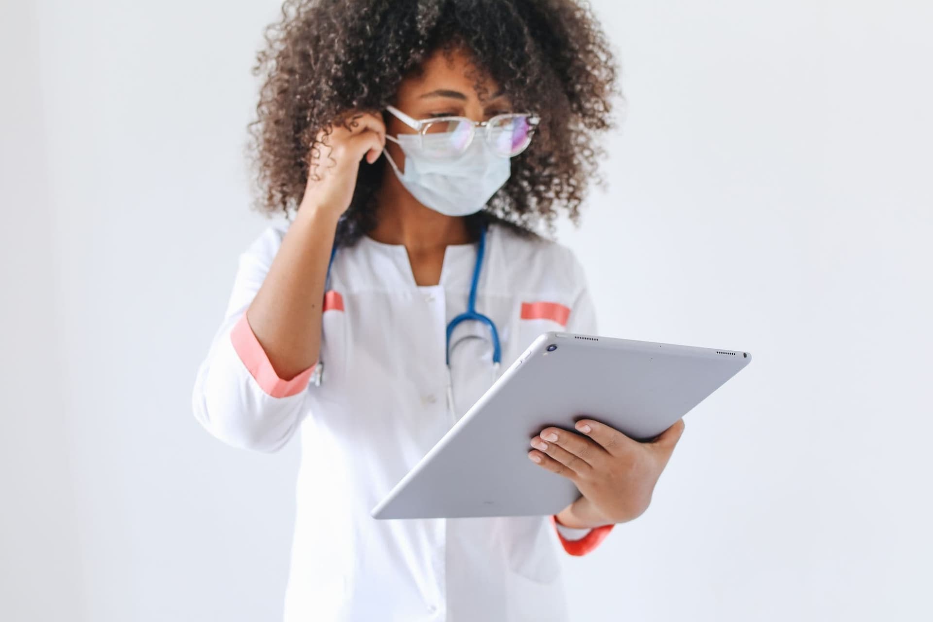 Doctor reviewing information on a tablet